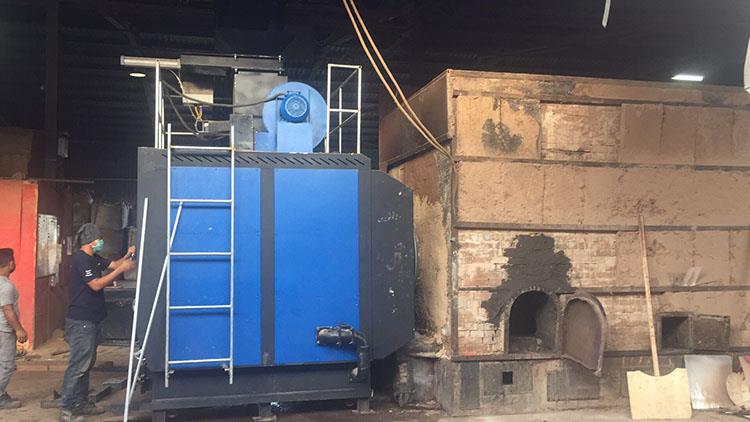 installed biomass burner connect to pellet mill